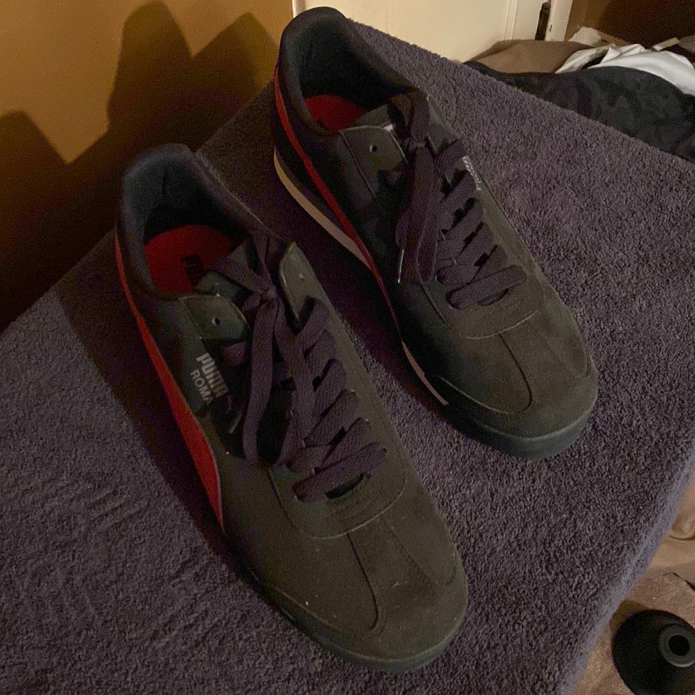 Puma Roma which are Black with a Red Stripe!